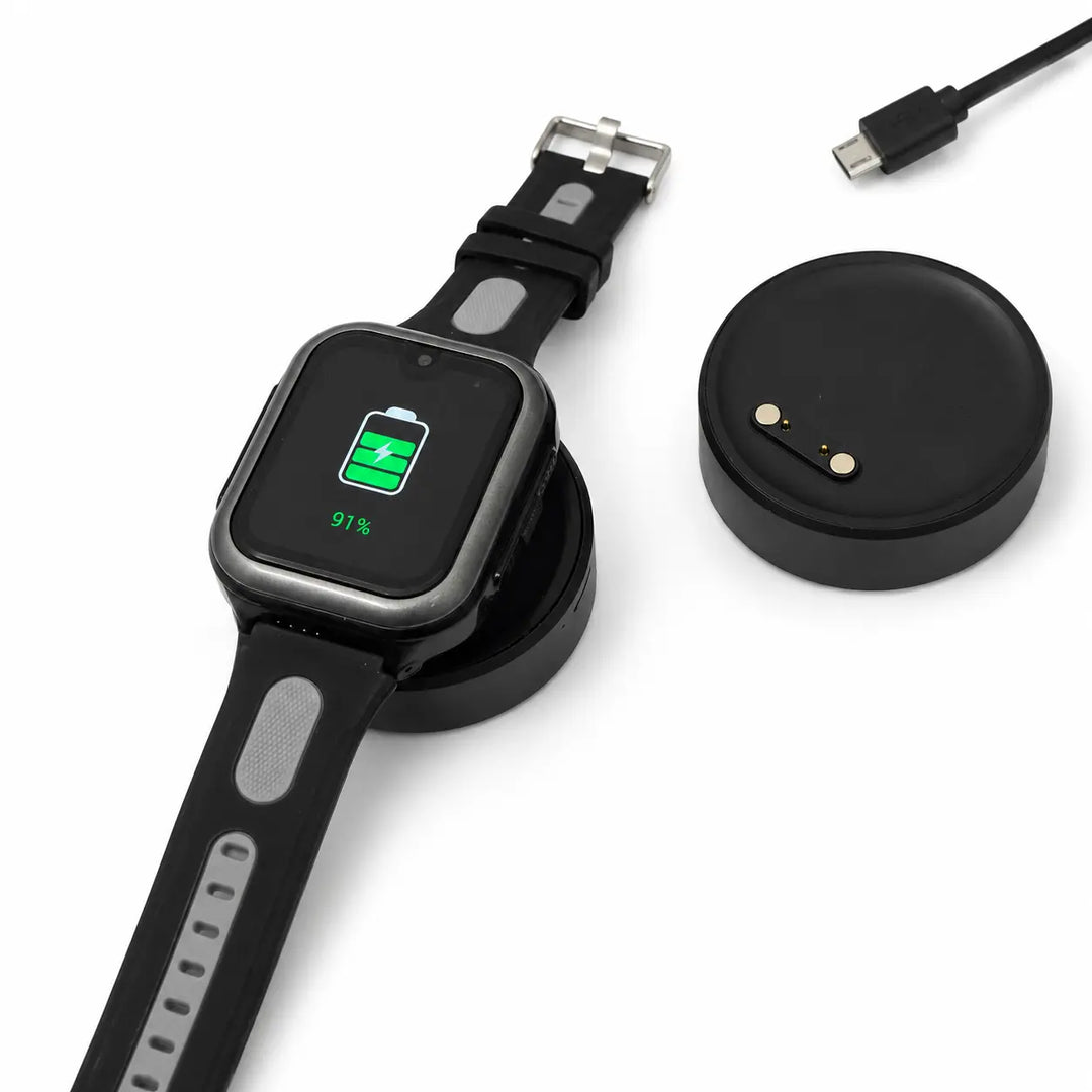 Lil Tracker GPS watch charging on portable cordless charging dock