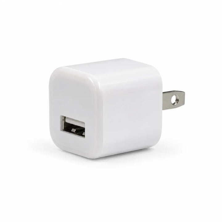 White USB wall adapter on a white background